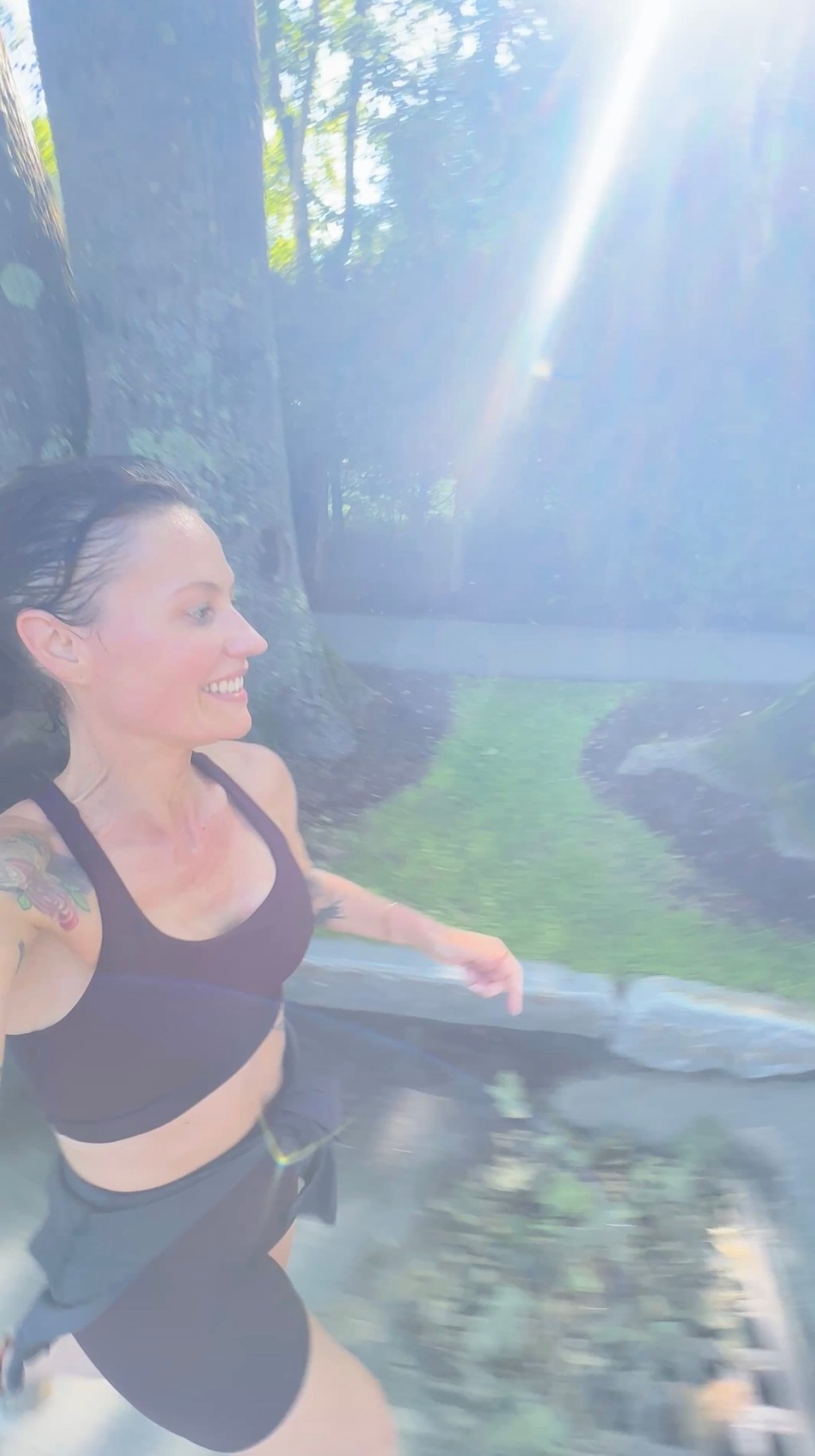 Ashley Kelsch running outdoors on a sunny morning.